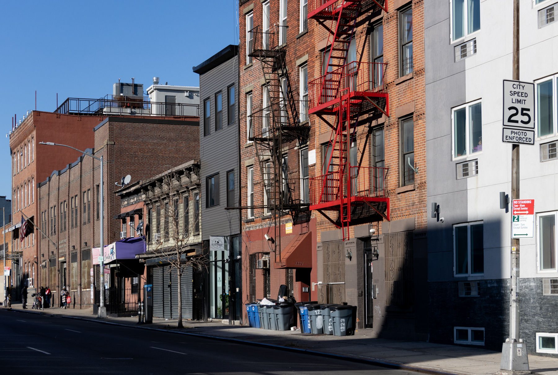 wood frame buildings and the brevoort post office on atlantic avenue near nostrand