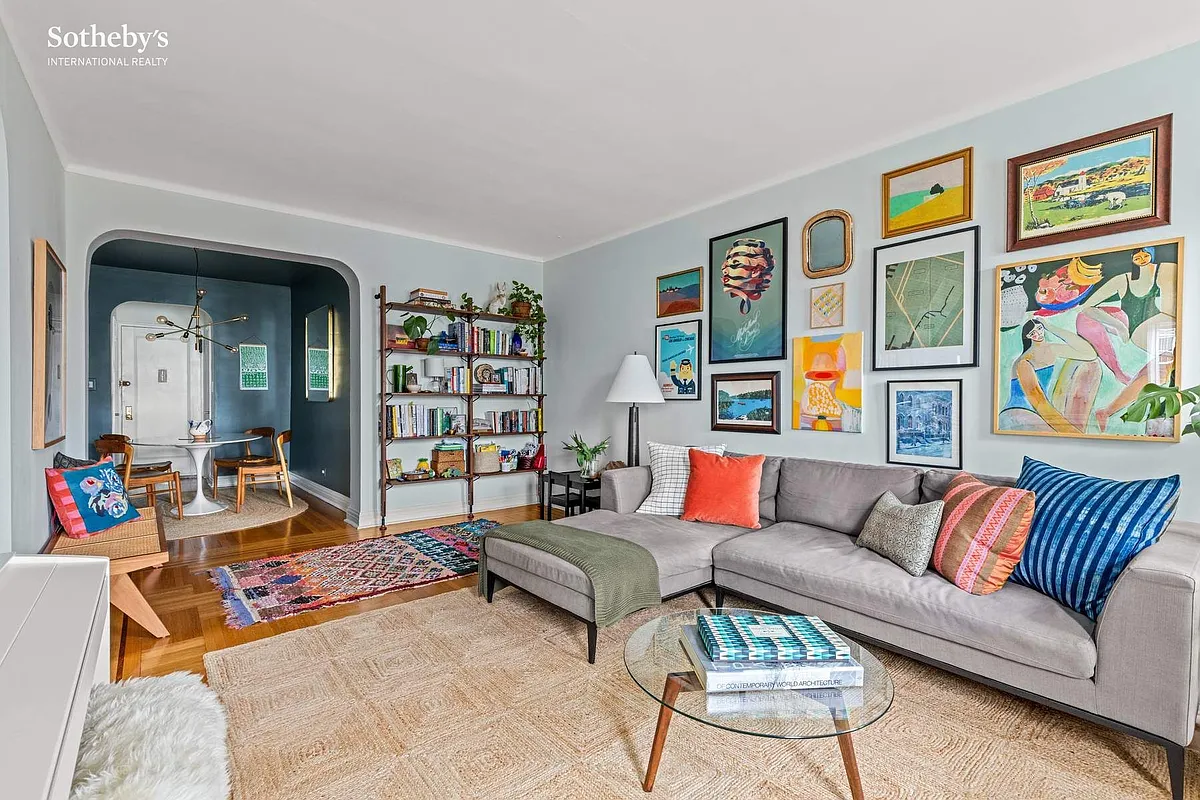 brooklyn - living room with arched doorway, blue walls