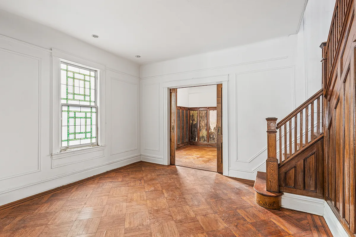 brooklyn - living room with original wood staircase